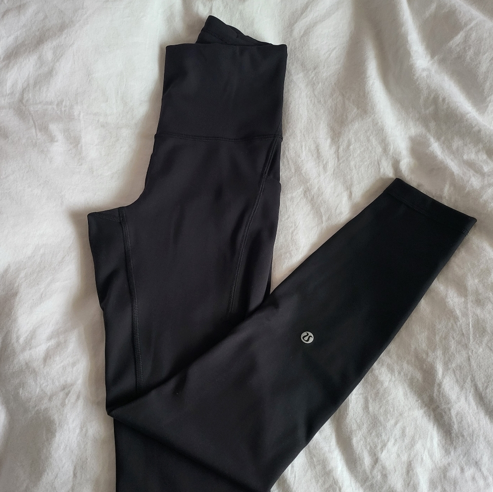 Lululemon Wunder Train HR Tight 25" Pockets sz 4